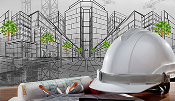 stock photo - hard hat and blueprints