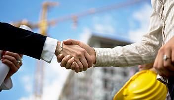 Stock photo - two people shaking hands