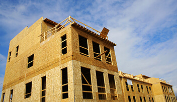 Stock photo - framed building during construction
