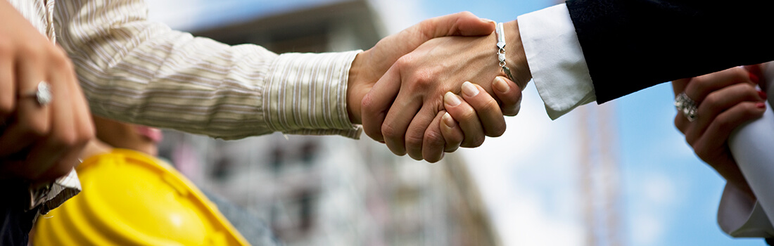 Stock photo - two people shaking hands