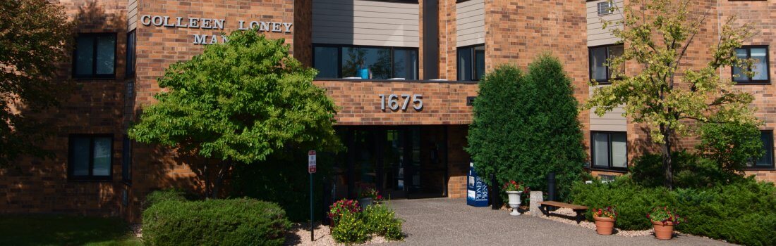 Exterior photo of Colleen Loney Manor apartment building in West St. Paul.