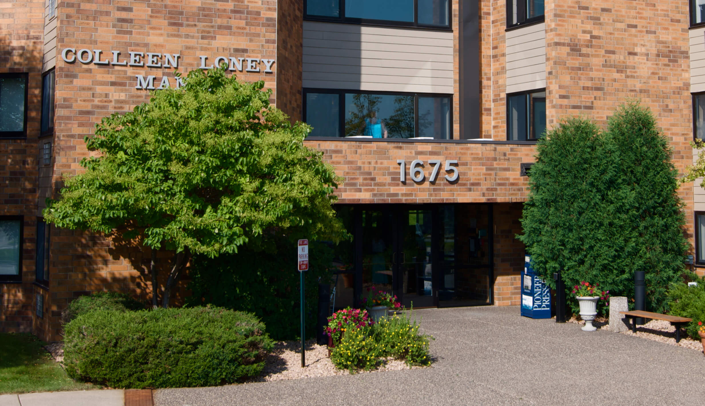 Exterior photo of Colleen Loney Manor apartment building in West St. Paul.